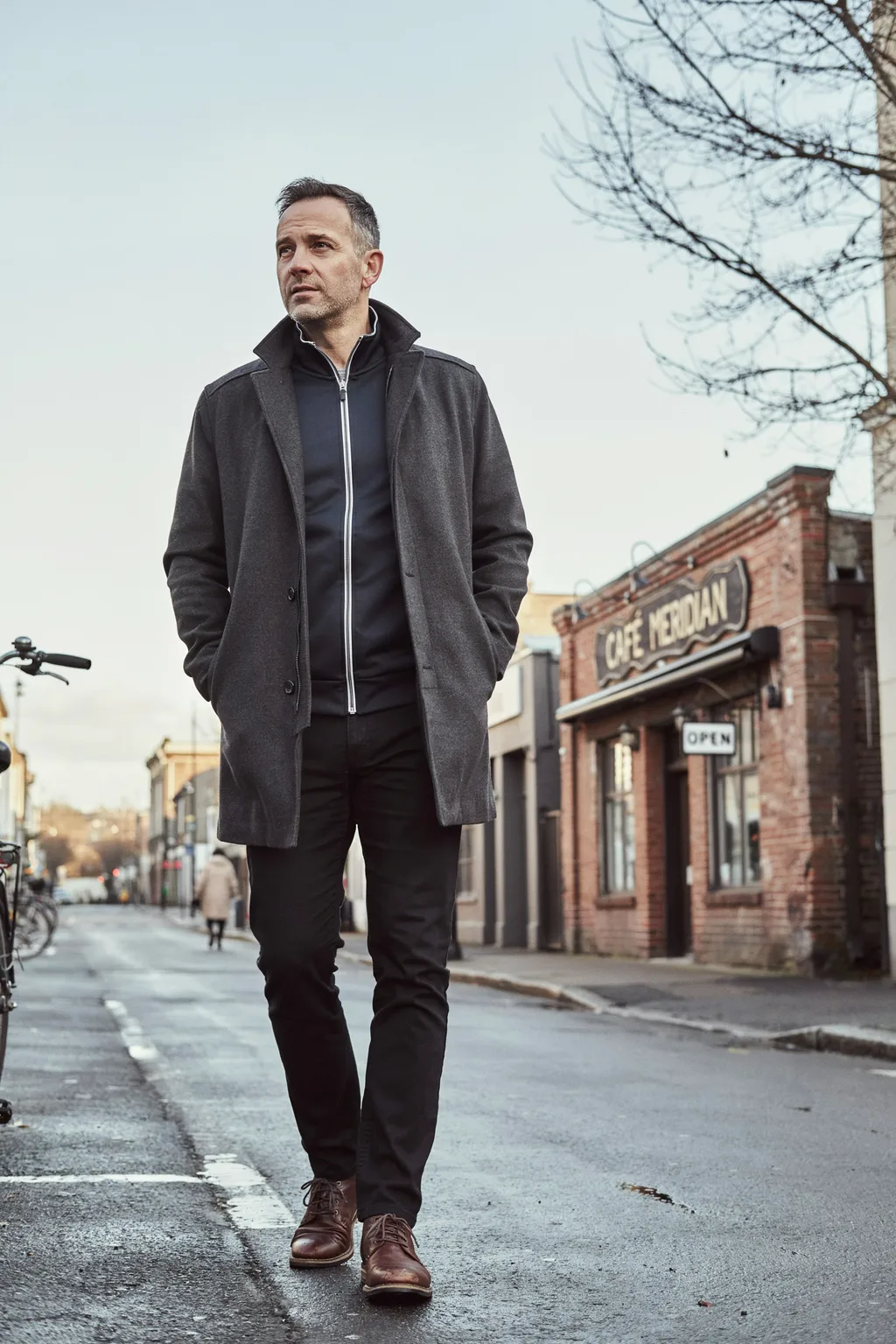 Track Jacket Zipped Under a Coat